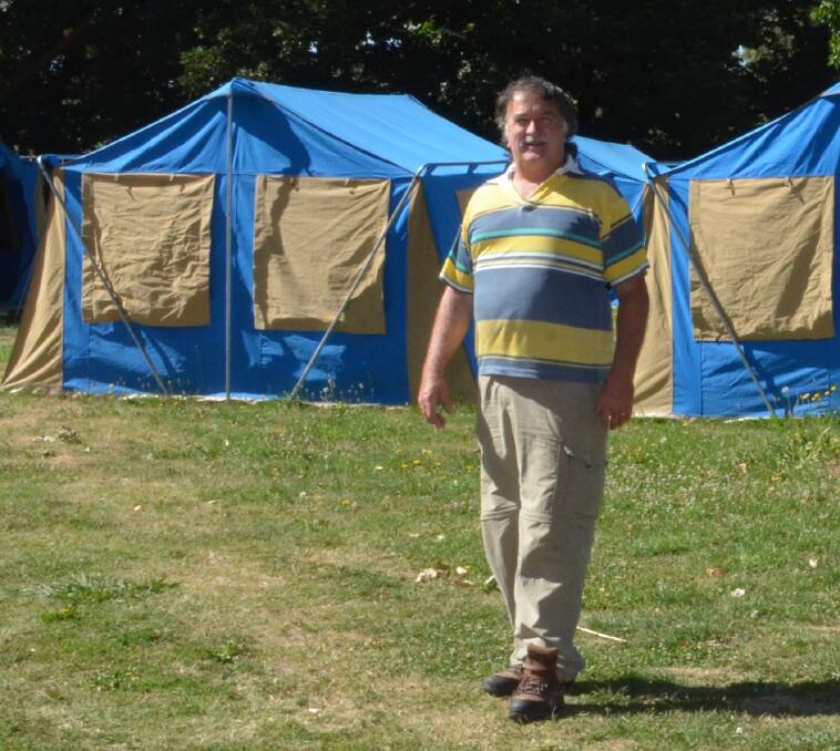 UNDER CANVAS: Tent Town owner Pete Crewes at the Foxhole area. Photo: DAVID FITZSIMONS 