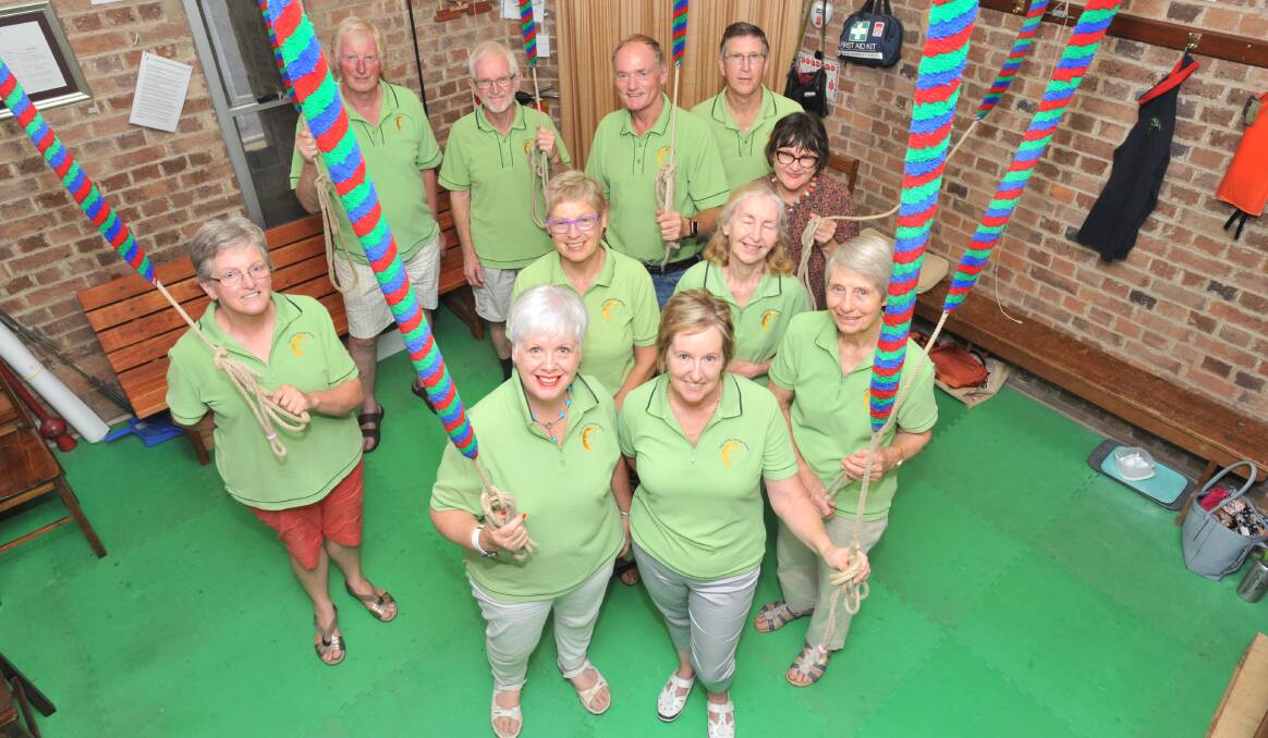GREEN MACHINE: Bell ringers (front row) Jennifer Derrick, Sheena Snowdon, Jean Baldwin, (middle) Norma Cother, Chris Stanger, Joy Fabry, Libby West, (back) Jim Woolford, Ric Cother, Bob Derrick and Rod Wykes. Photo: JUDE KEOGH 