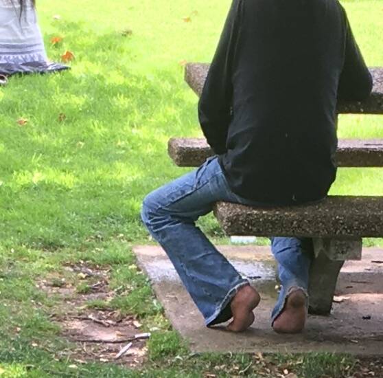 CAUGHT: Cr Kevin Duffy's photo of a man urinating in Robertson Park in broad daylight.
