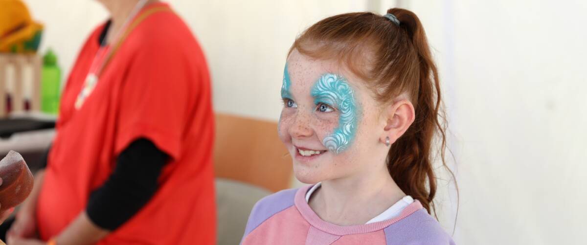 HAPPY FACE: Charlie Reynolds was all smiles after getting her face painted at the markets. Photo: ANDREW MURRAY1015amfete3