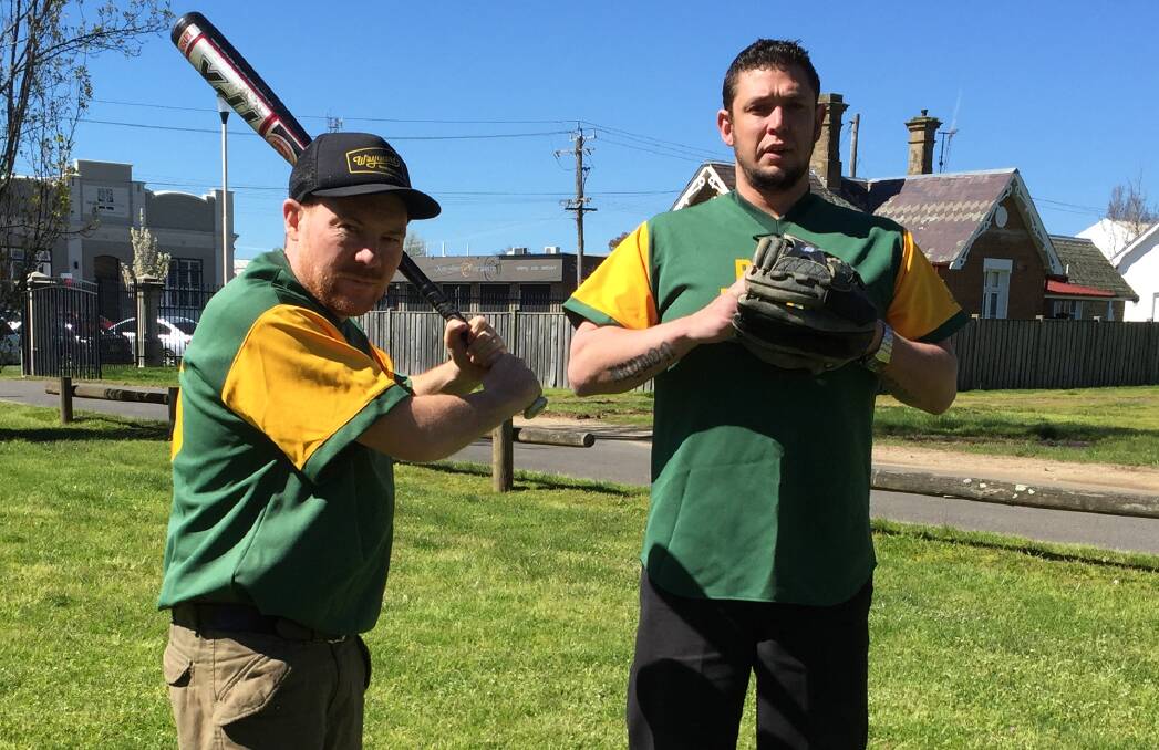 GREEN AND GOLD: Terry Bruton and Adam Sherwood have signed up to play baseball for the revived Orange Royal Raiders team. Photo: DAVID FITZSIMONS