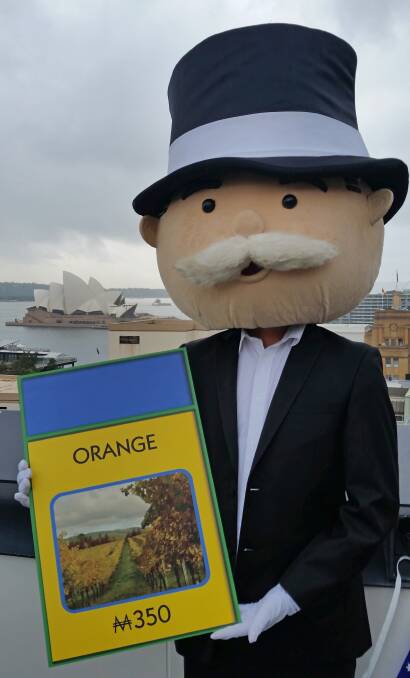 IN THE MONEY: The Monopoly man with the Orange square with its image of Borrodell Vineyard.