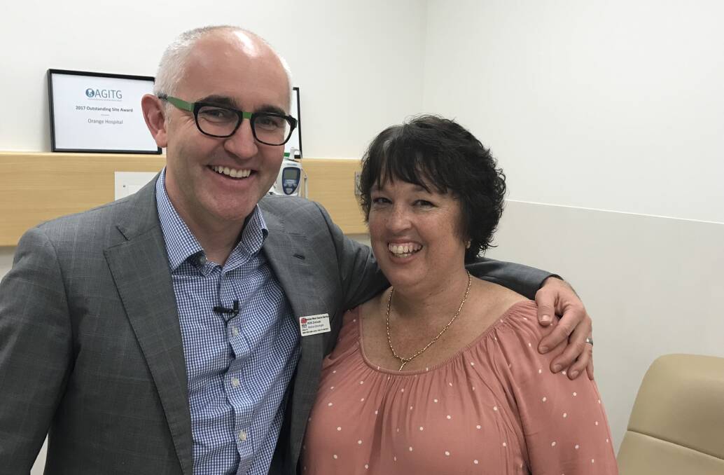 IN THIS TOGETHER: Clinical trials unit director Dr Rob Zielinski with patient Linda Golding at Orange hospital. Photo: Supplied