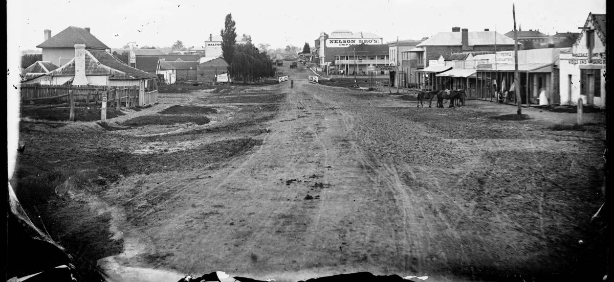 MEMORY LANE: Looking down Summer Street from Peisley Street toward Dalton Bros (now the closed Myer store) and the Nelson Bros stores. Photos: State Library NSW