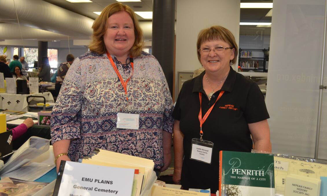REACHING OUT: Sharon Philpott and Judith McLeod were manning the Nepean Family History Society stall. Photo: DAVID FITZSIMONS 0922dffamily2