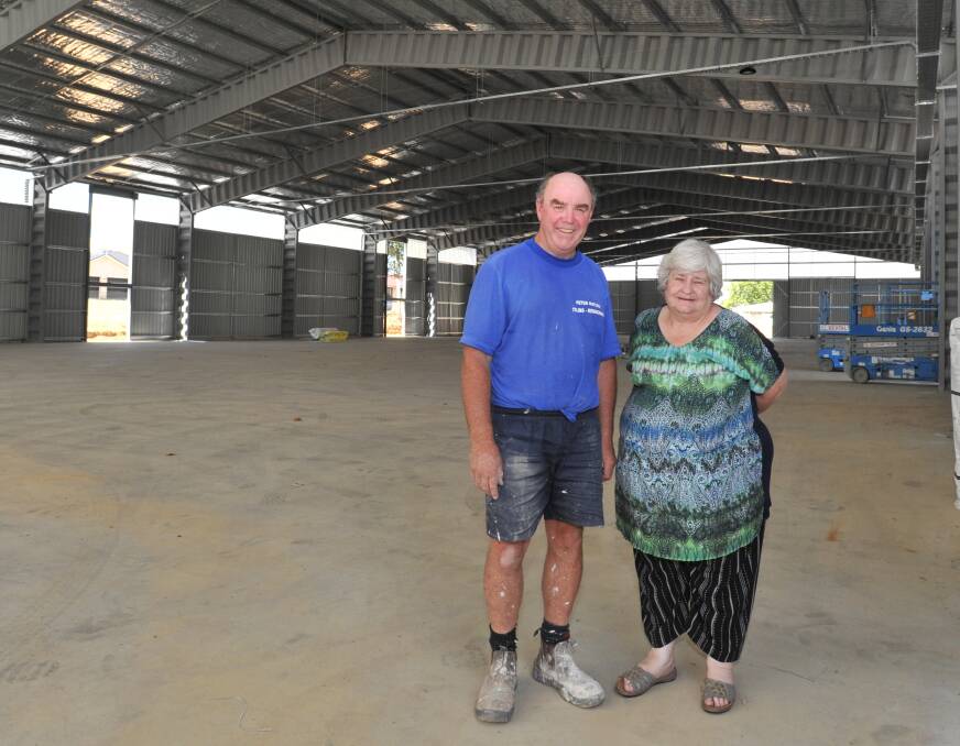 ON WITH THE SHOW: Orange show organisers Peter Naylor and Sue Milne inside the new pavilion they are keen to fill with exhibitors on May 13-14 Photo: JUDE KEOGH