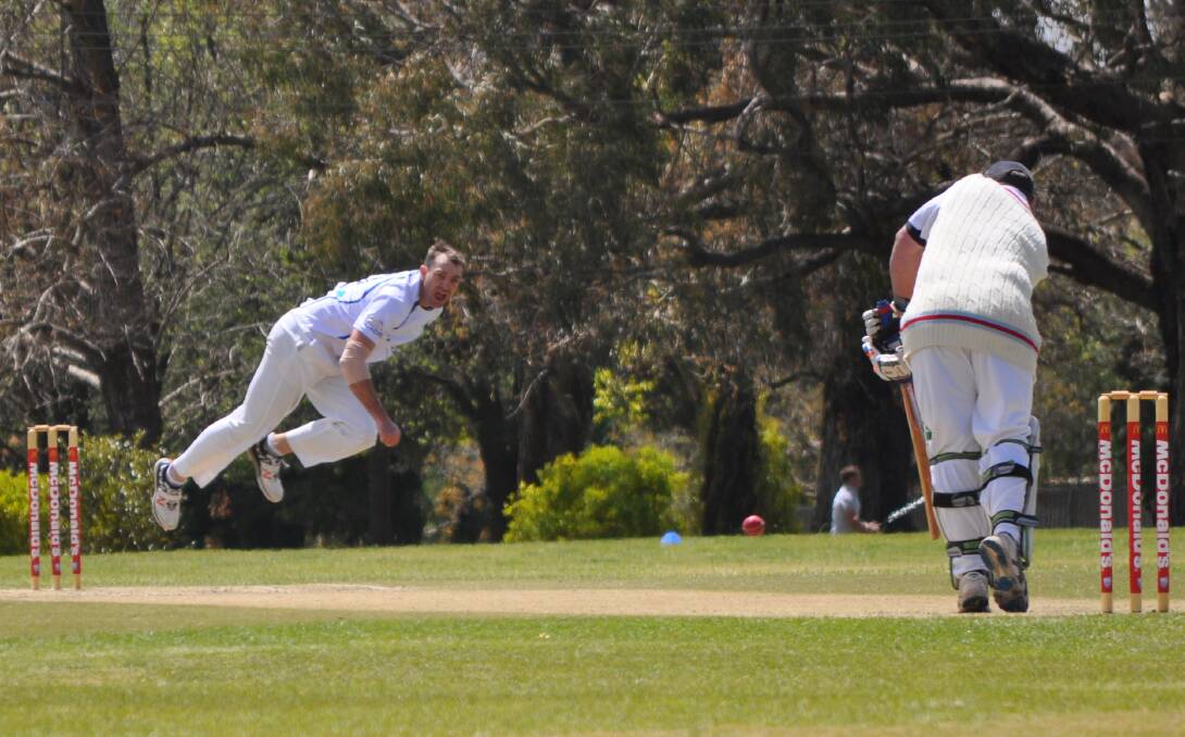 IN FULL FLIGHT: Orange paceman Daryl Kennewell picked up three wickets but it was not enough to stop Cowra from winning. Photo: NICK McGRATH