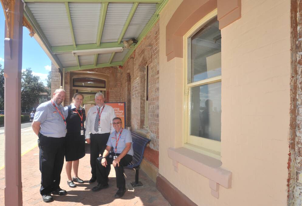 OLD IS NEW: Mick Herft, Belinda Roberts, Michael Meredith, David Rome inspect the test colour wall at the station. Photo: JUDE KEOGH