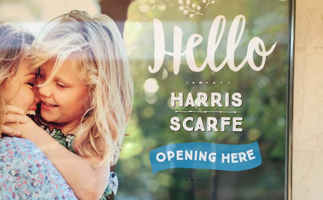 WELCOME: There is still 16 months to go but the first Harris Scarfe signs are up.