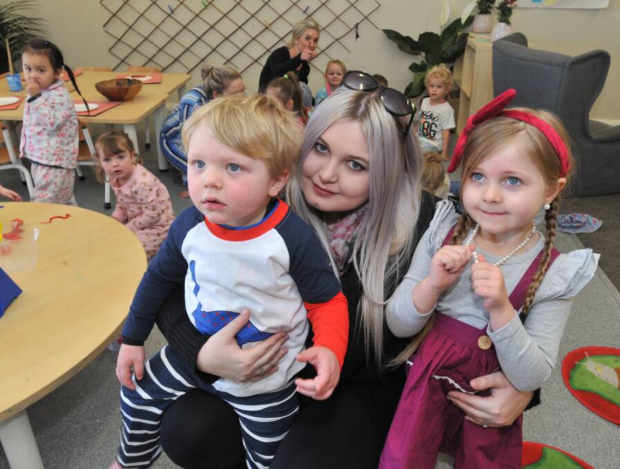 CARING FAMILY: Harrison Bannon, 3, mum Bonnie Parry-Jones and Ava Bannon, 5, at the Great Beginnings Orange daycare centre. Photo: JUDE KEOGH jk0727harry9