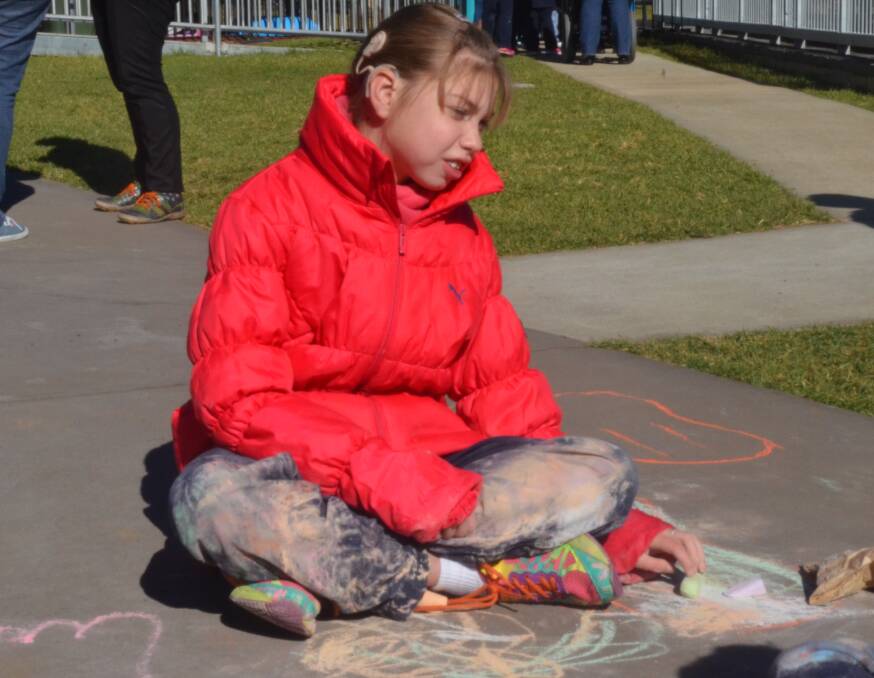 IMMERSED IN HER WORK: Year 7 student Breanna Lewis was busy drawing at the Anson Street School National Reconciliation Week activity. Photos: DAVID FITZSIMONS