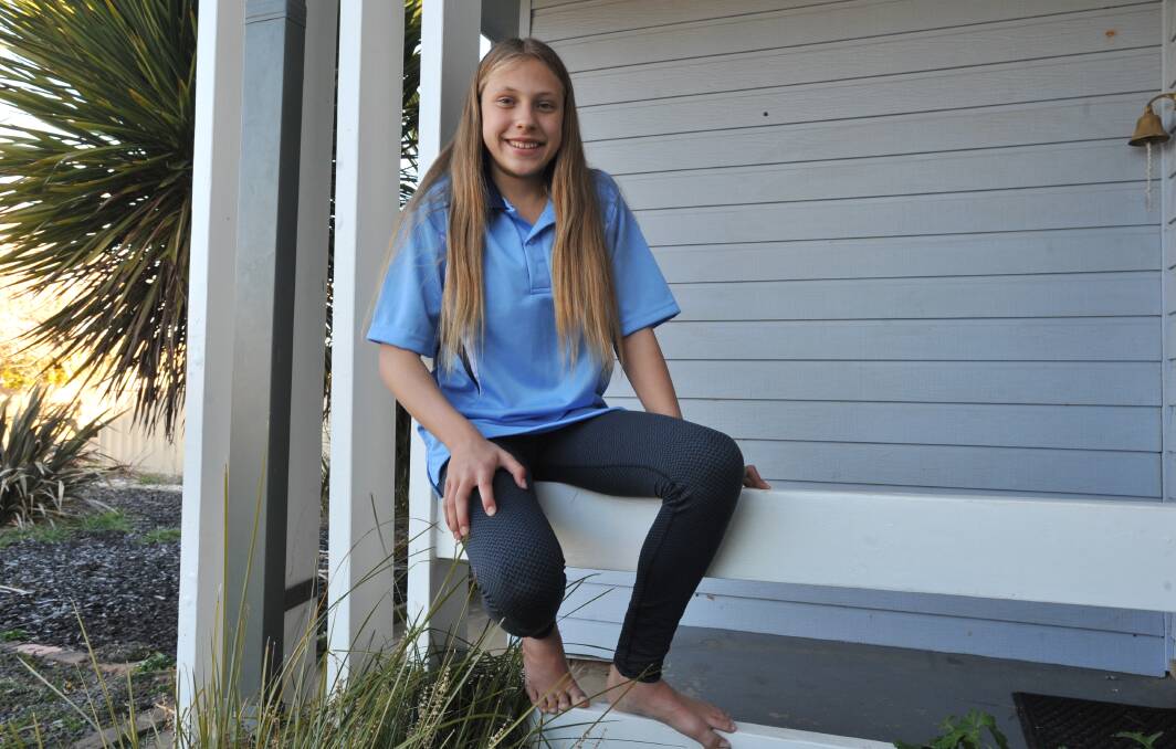 MULTI-SPORT: Kaitlyn Hinrichsen has a hectic month coming up competing in swimming, running and cross country titles. Photo: JUDE KEOGH 0725jkrun1