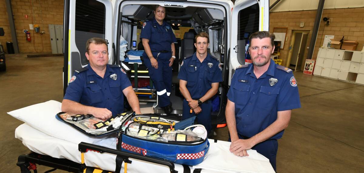 ON CALL: NSW Ambulance paramedics Matt Tucker, Leah Butcher, Jock Cartwright and Inspector Rhys Dive in Orange. Photo: JUDE KEOGH 1312jkambos1