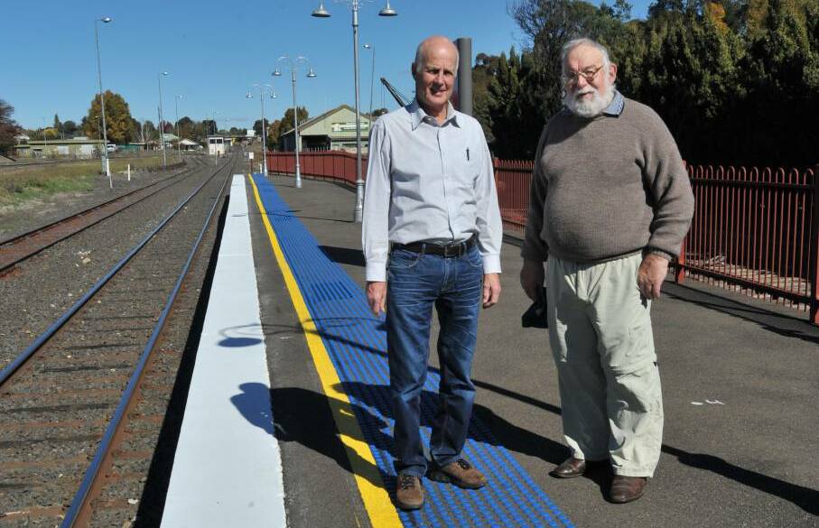 DETERMINED: Rail Action Group members Neil Jones and Phil Stevenson want improved services for Orange. Photo: JUDE KEOGH  