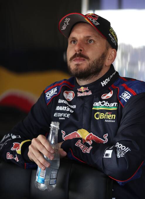 SHATTERED: Paul Dumbrell watches the closing stages of the 1000.