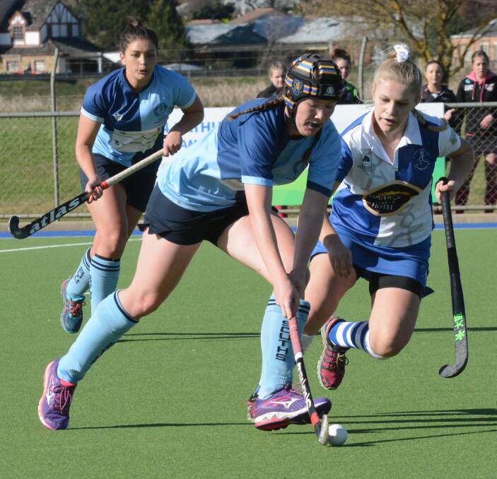 ON A ROLL: Sarah Watterson (left) and her Souths team-mates have a sniff of finals hockey after back-to-back wins last weekend. They are hoping to beat Dubo today to stay in the hunt. Photo: PHILL MURRAY 062516psouths2