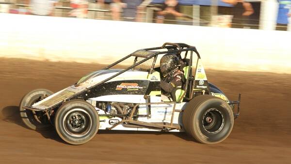 LAPPING IT UP: Mick Gray in his wingless speedway car.