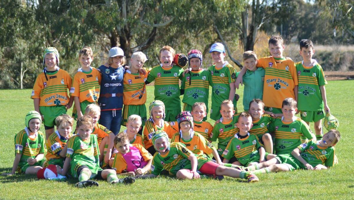 ALL TOGETHER: Both the CYMS Yellow and CYMS Green teams have had great years in the under 10s competition, with the Green boys in action on grand final day. 