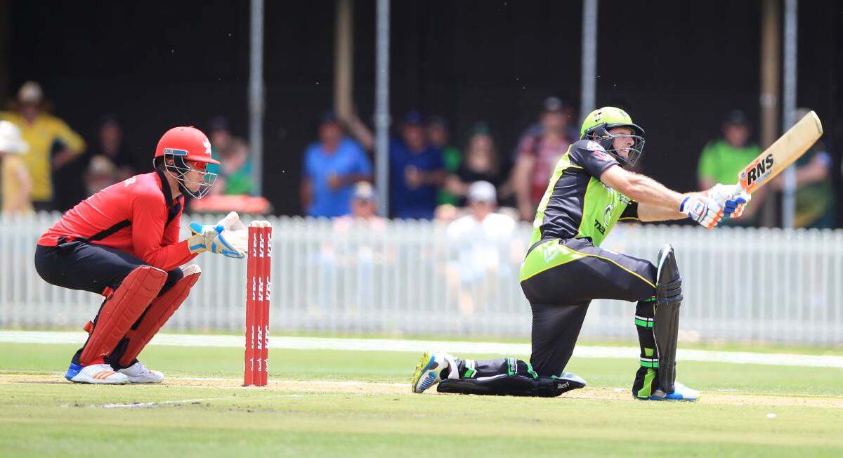 THERE GOES THAT ONE: Ben Rohrer launches one into the crowd at Wade Park on his way to 63 not out. Photo: PHIL BLATCH