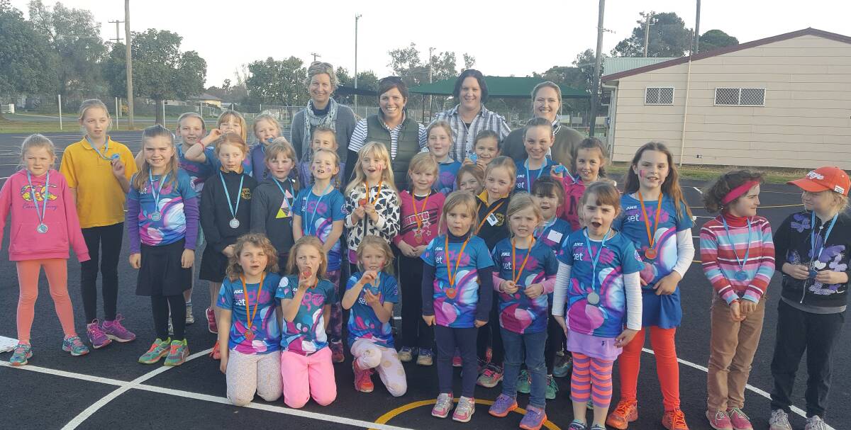 AWARD WINNER: Mandy Townsend (back, second from left) has been a big part of Canowindra netball. Photo: Contributed