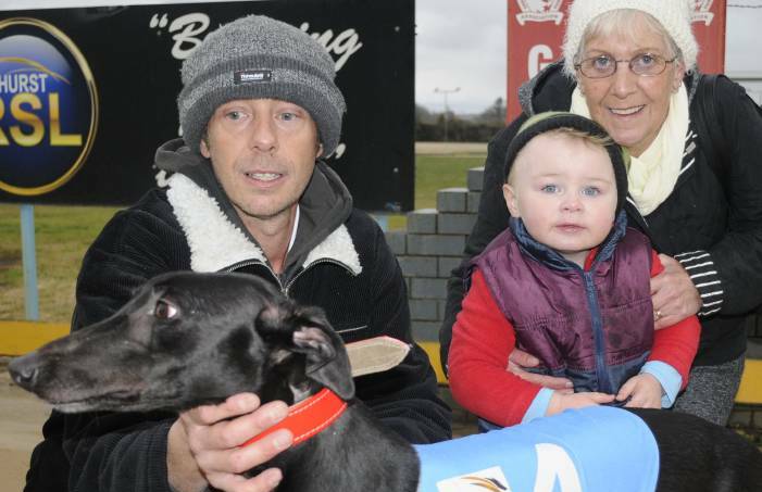 HAPPY FAMILY: Trainer Anthony Coyte with mum Ann and son Ryan after Smokey Queen's victory at Kennerson Park on Monday. Photo: CHRIS SEABROOK 062716cdogs1
