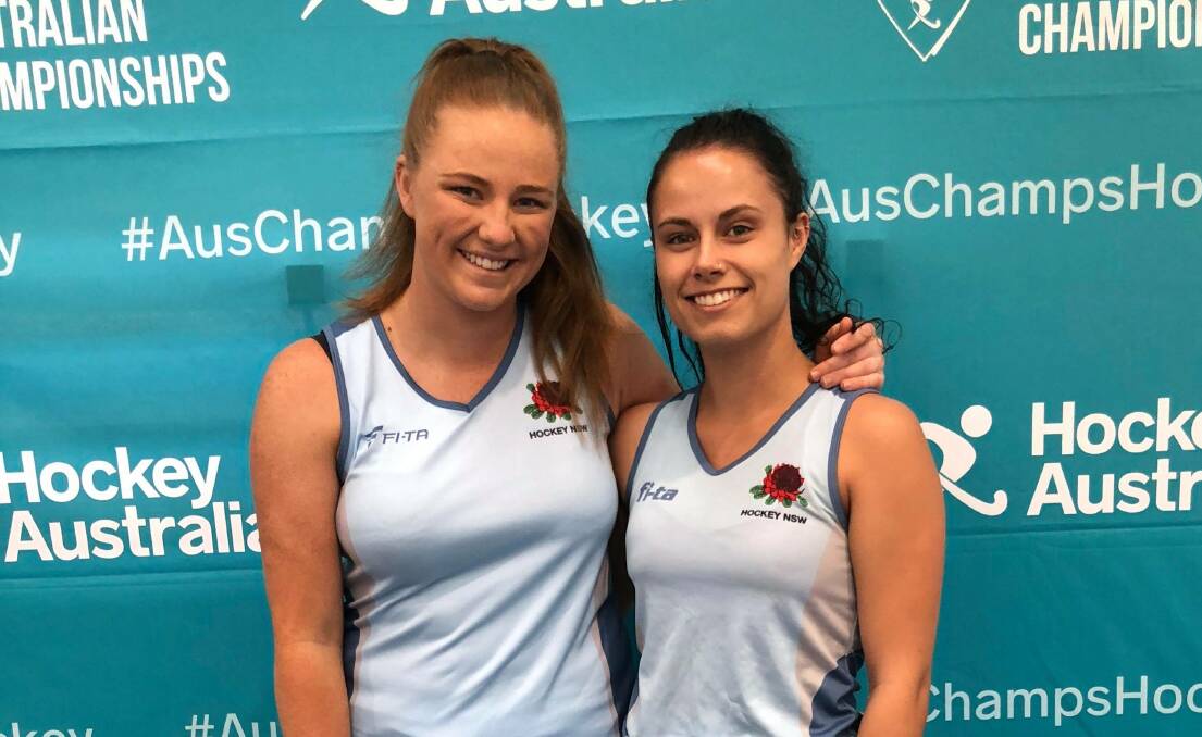 BACK IN BLUE: Orange guns Chloe Barrett and Rach Divall will represent NSW together at the under 21s Women's Indoor National Championship at Goulburn this week. Photo: HOCKEY NSW