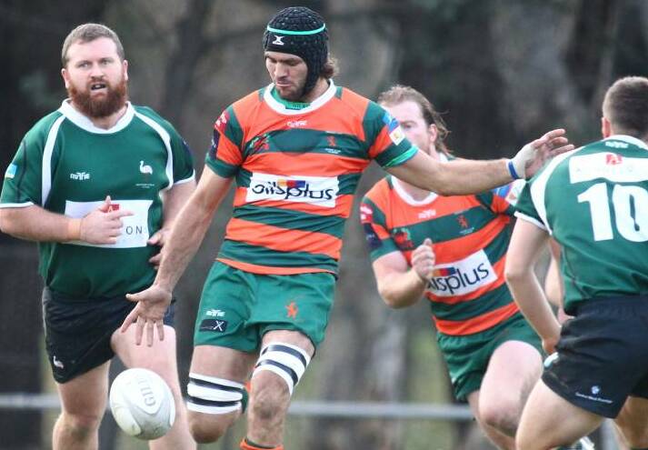 PUTTING IN THE BOOT: Duncan Young was Orange City's only try-scorer during a tough outing at Forbes on Saturday. Photo: PHIL BLATCH