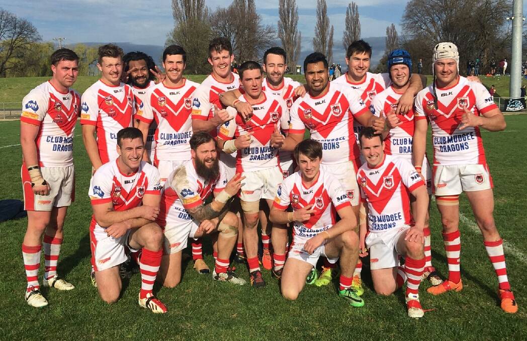 THE MIGHTY RED V: The 2016 Dragons after holding on to beat the Bathurst Panthers in last weekend's preliminary final at Carrington Park. 