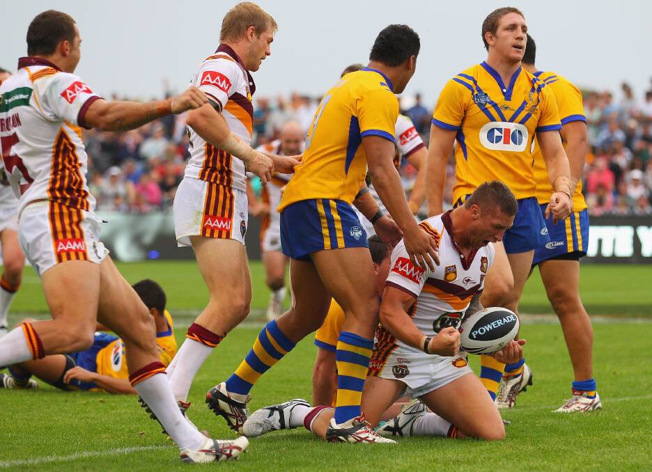 OH YEAH: Tariq Sims crosses for one of his two tries at Mudgee in 2012. Photo: GETTY