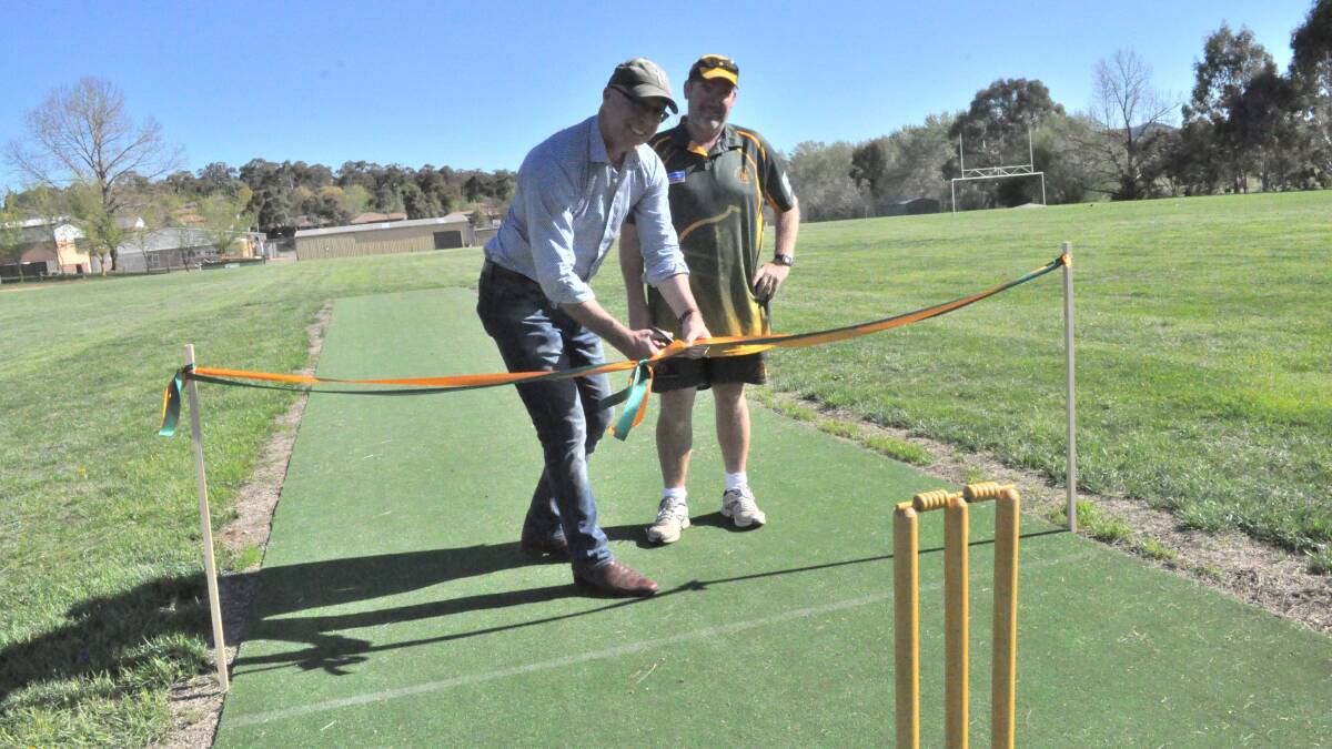 IT'S OFFICIAL: ODJCA president David Cumming with Orange CYMS Cricket Club president Gerard Hannelly. The pair opened the new synthetic pitch at Norton Park on Thursday. Photo: NICK McGRATH
