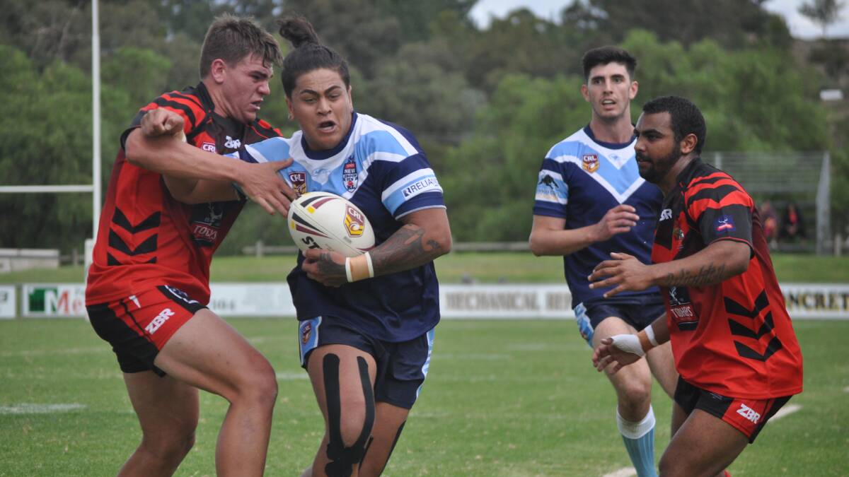 HANDFUL: Rakai Tuheke was a stand-out for Group 10 in a 26-24 loss to Group 11 on Saturday. Photo: NICK McGRATH