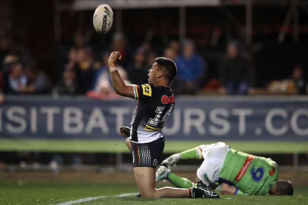 OH YEAH: Wellington product Tyrone Peachey capped a fine game for the Panthers with the match-winning try in front of friends and family at Carrington Park. Photo: GETTY IMAGES