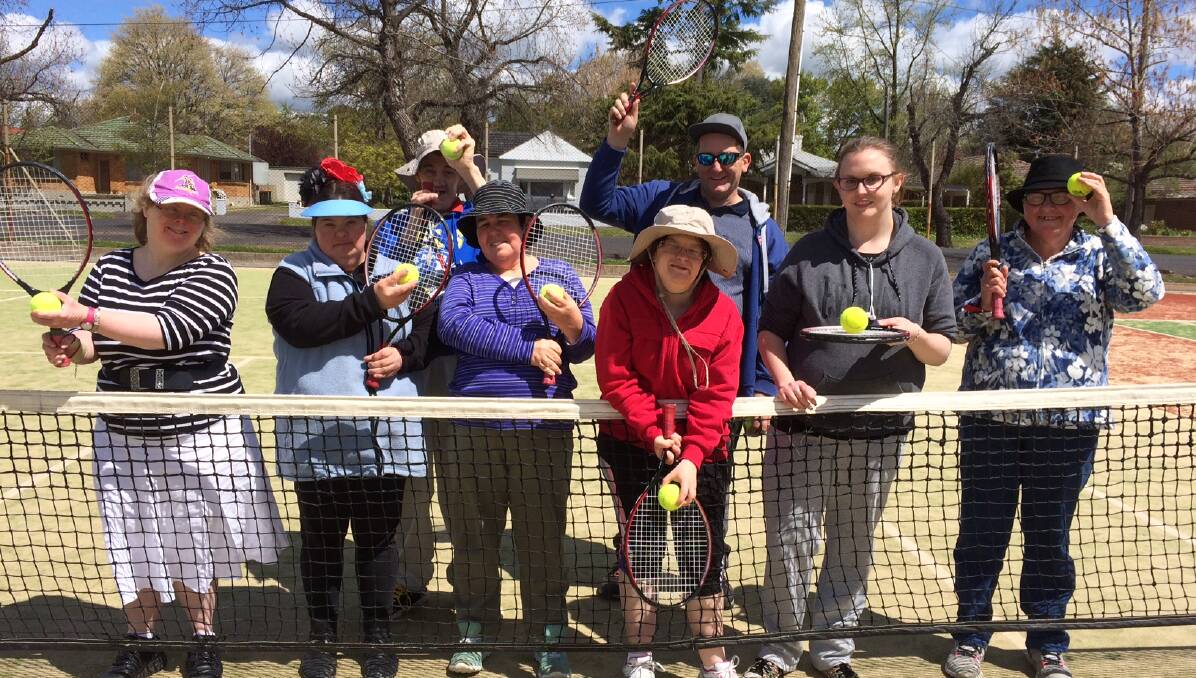 ALL SMILES: The OCTEC Disability group has enjoyed its tennis at the club during the last month.