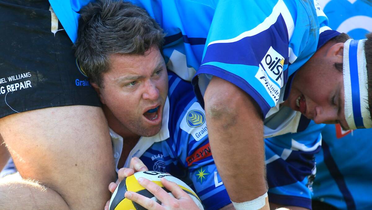 NO WAY: Blayney Rams half Anthony Salmon is upset by this roughhousing in last year's grand final. Photo: PHIL BLATCH