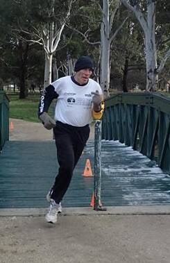 WHAT A TIME: The Runners Club's number one timing guru, Michael Sharp, enjoying a rare run at Elephant Park last Sunday. Photo: Contirbuted
