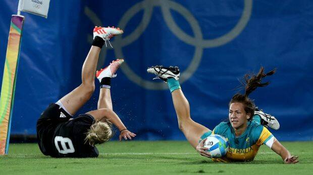 Evania Pelite goes over for a try. Photo: Getty Images
