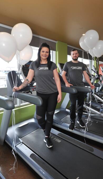 TREADMILL CHALLENGE: Anytime Fitness club manager Megan Griffin and assistant manager Eoin Scullion are supporting White Balloon Day. Photo: JUDE KEOGH 