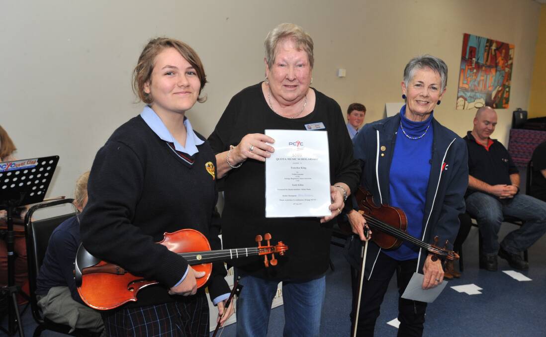 PROACTIVE: Taneika King received the Quota Scholarship from Quota's Jenny Sands and PCYC music coordinator Robin Thompson on Tuesday. Photo: JUDE KEOGH 
