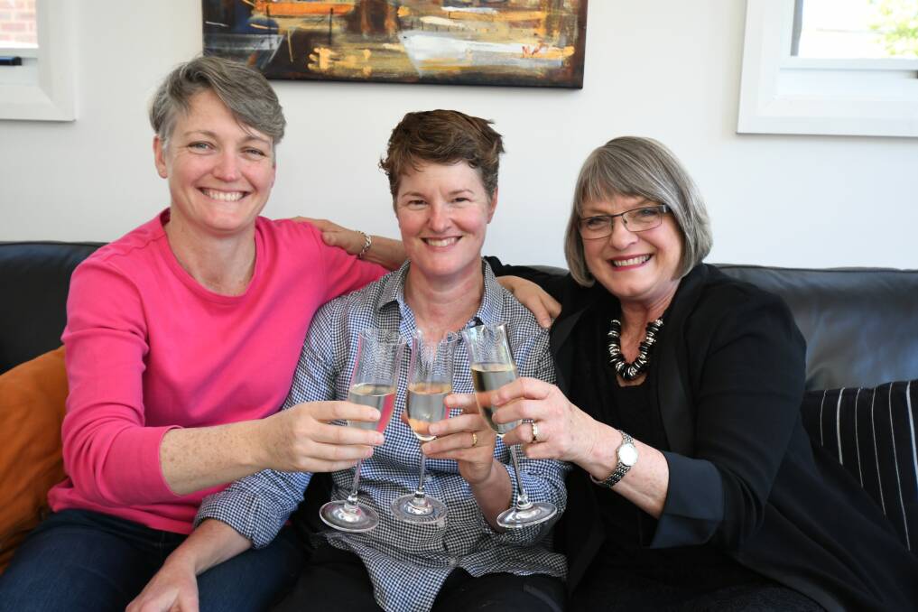 CHEERS TO CHANGE: Orange couple Joanne McRae, Heather Cameron and Joanne's mother Kathryn McRae are relieved same-sex marriage has been made legal. Photo: JUDE KEOGH