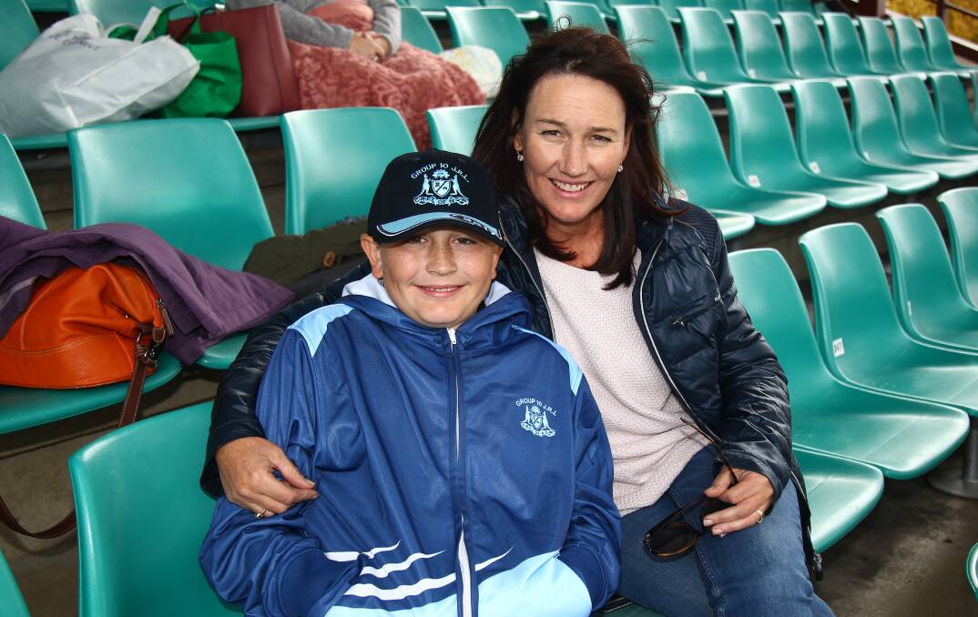MOTHER'S DAY OUT: Daniel and Carol Kable attended the Hawks v Wolves group 10 rugby league match. Photo: PHIL BLATCH