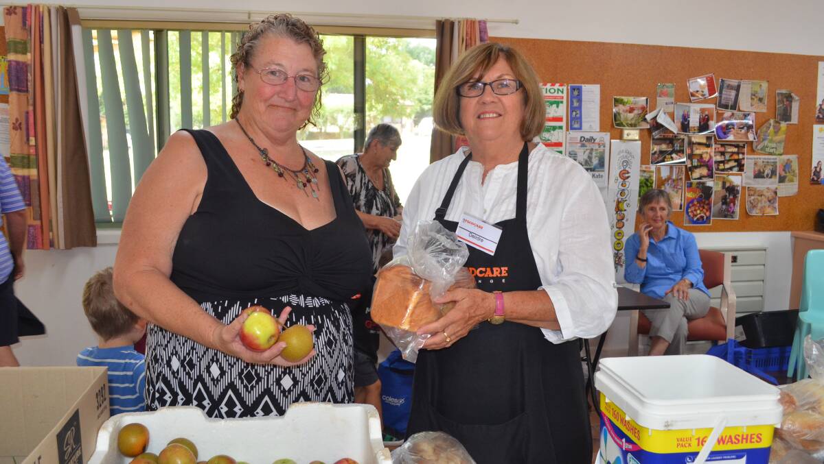 SOCIAL EXPERIENCE: FoodCare customer Beryle Conran-Bloomfield and volunteer Deirdre Beasley.