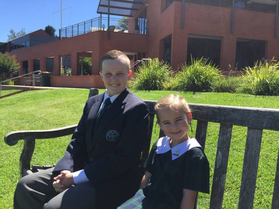 EAGER TO START: Toby Gough is looking forward to starting year 7 and Harper Purvis is ready to start kindergarten at Kinross Wolaroi School on January 31. Photo: TANYA MARSCHKE