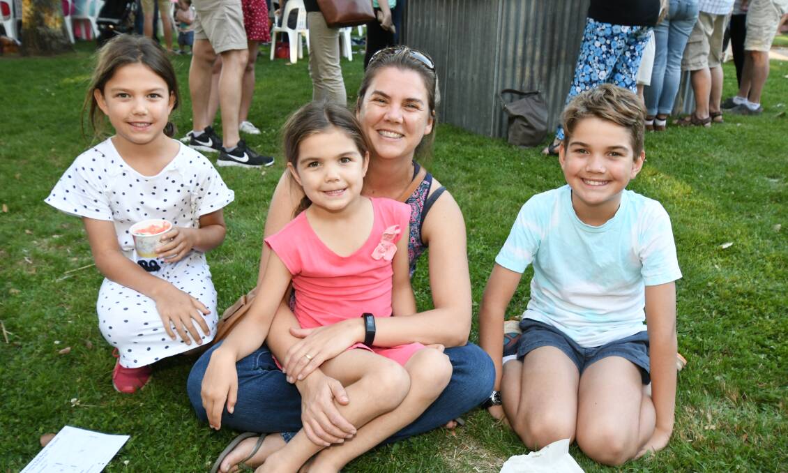 Families and friends enjoyed a night out at the night market in Robertson Park as part of the Banjo Paterson Australian Poetry Festival. Photos: JUDE KEOGH