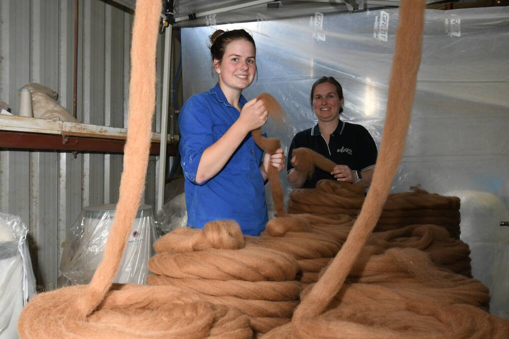 HANDS ON: Kinross Wolaroi School student Harriet O'Brien with Adagio Mill owner Nadine Hulme at the mill where she's been doing a work placement. Photo: JUDE KEOGH