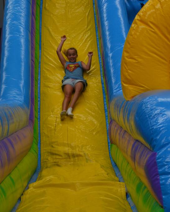 FUN-FILLED ATTRACTION: Olivia Kacarouski said she enjoyed the giant slide the most at the Jump Inflatables playground at the indoor tennis centre. 0112tmjump2