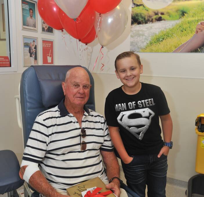 CALL TO DONATE: Jeffrey Nash, who made his 97th blood donation on Tuesday, and cancer survivor Joshua Johansen, who relied on dozens of donations during his treatment, are calling for people to donate. Photo: JUDE KEOGH