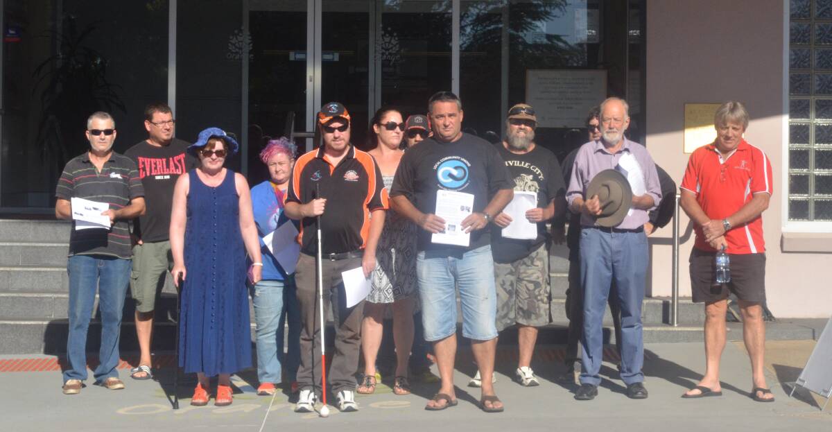 People from the Injured Workers Support Network and Environmentally Concerned Citizens of Orange met members of the NSW Nationals as they entered a regional party conference at the Orange Ex-Services' Club on Saturday.  