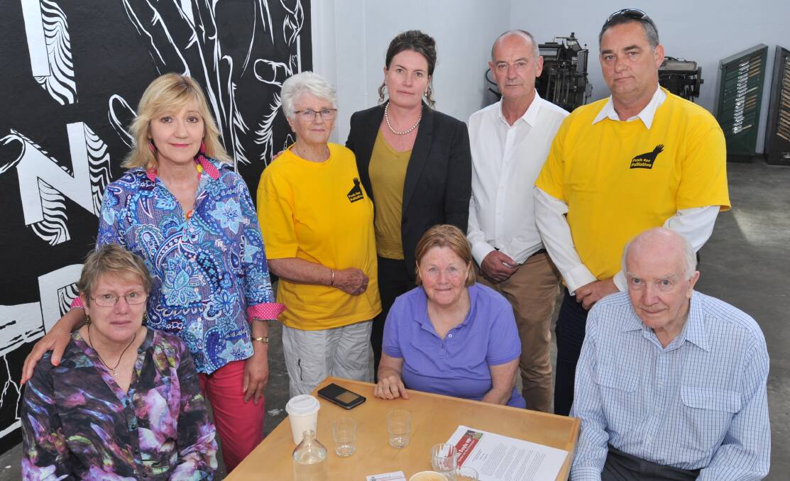 LOBBYING EFFORT: Push for Palliative members, front, Annette Mears, Robyn Maw and Peter Brown, back, Sue Duchnaj, Gail Pringle, Member for Blue Mountains Trish Doyle and Joe Maric. Photo: JUDE KEOGH 1027jkpush1 