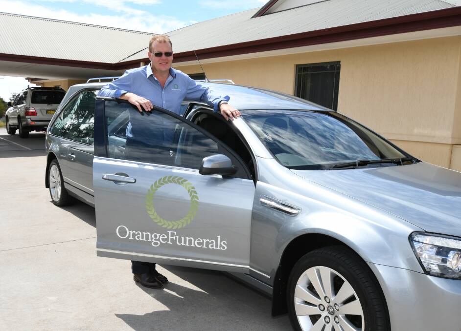 GIVE WAY: John McDonell of Orange Funerals is used to drivers cutting in at funerals. Photo: JUDE KEOGH