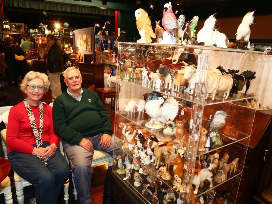 COLLECTORS DREAM: Pat and Ron Morrison at the Orange Antiques Fair on Sunday.